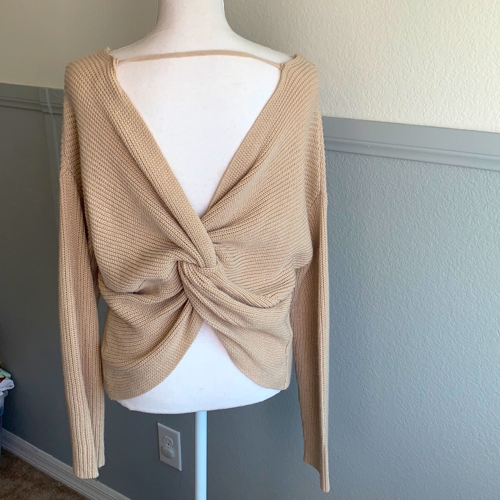 Knit sweater knot back detail